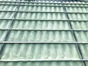 A close-up of closed-cell spray polyurethane foam (SPF).